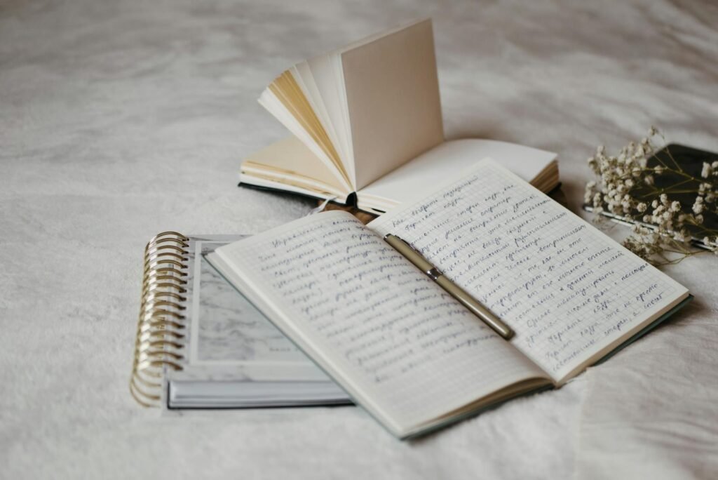 An Open Notebook with Pen